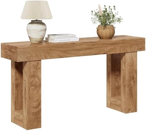 Oak finish console table in entryway