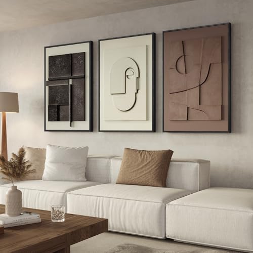 Large 3D textured abstract wall art set hanging in a modern living room